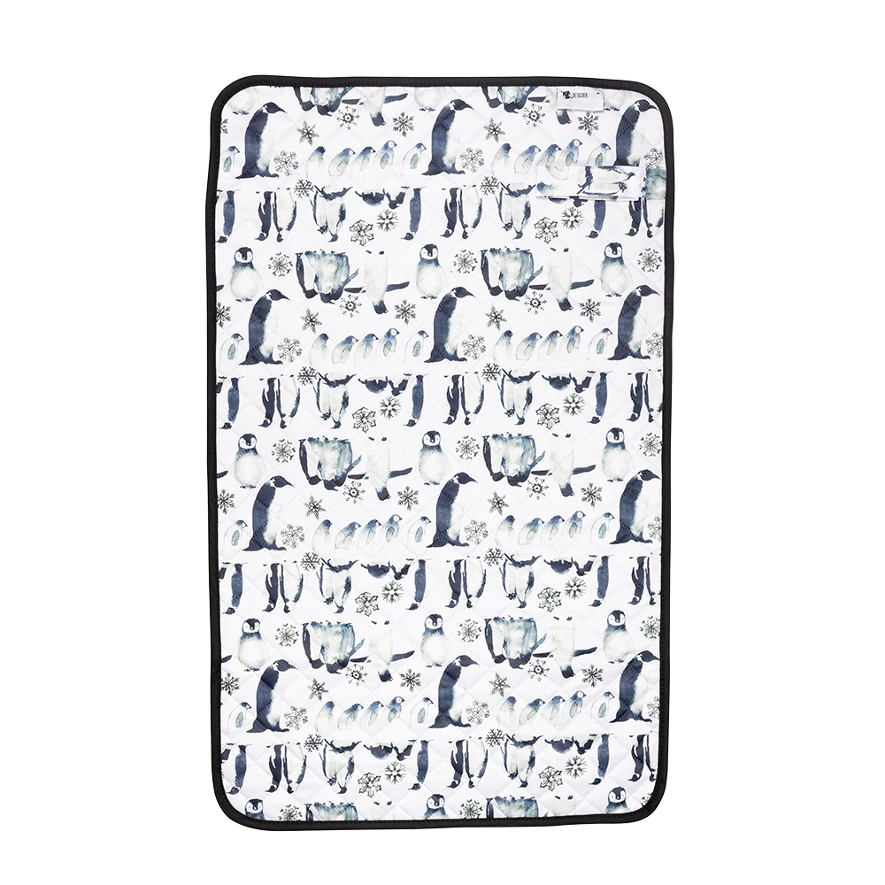 Penguin March Change Mat.