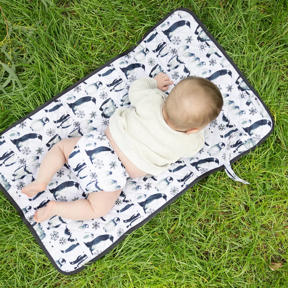 Penguin March Change Mat.